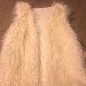 White faux fur vest
